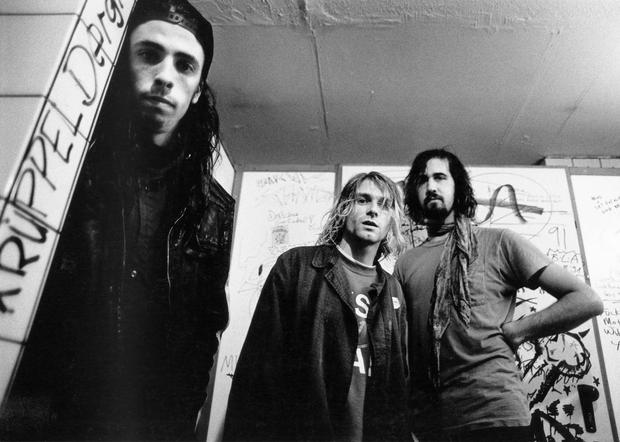 Left to right, Dave Grohl, Kurt Cobain and Krist Novoselic of Nirvana pictured in 1991, during the release of Smells Like Teen Spirit. Photo by Paul Bergen/Redferns